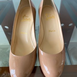 Size 37 christian louboutin nude pumps. Never worn. No box or dust bag.